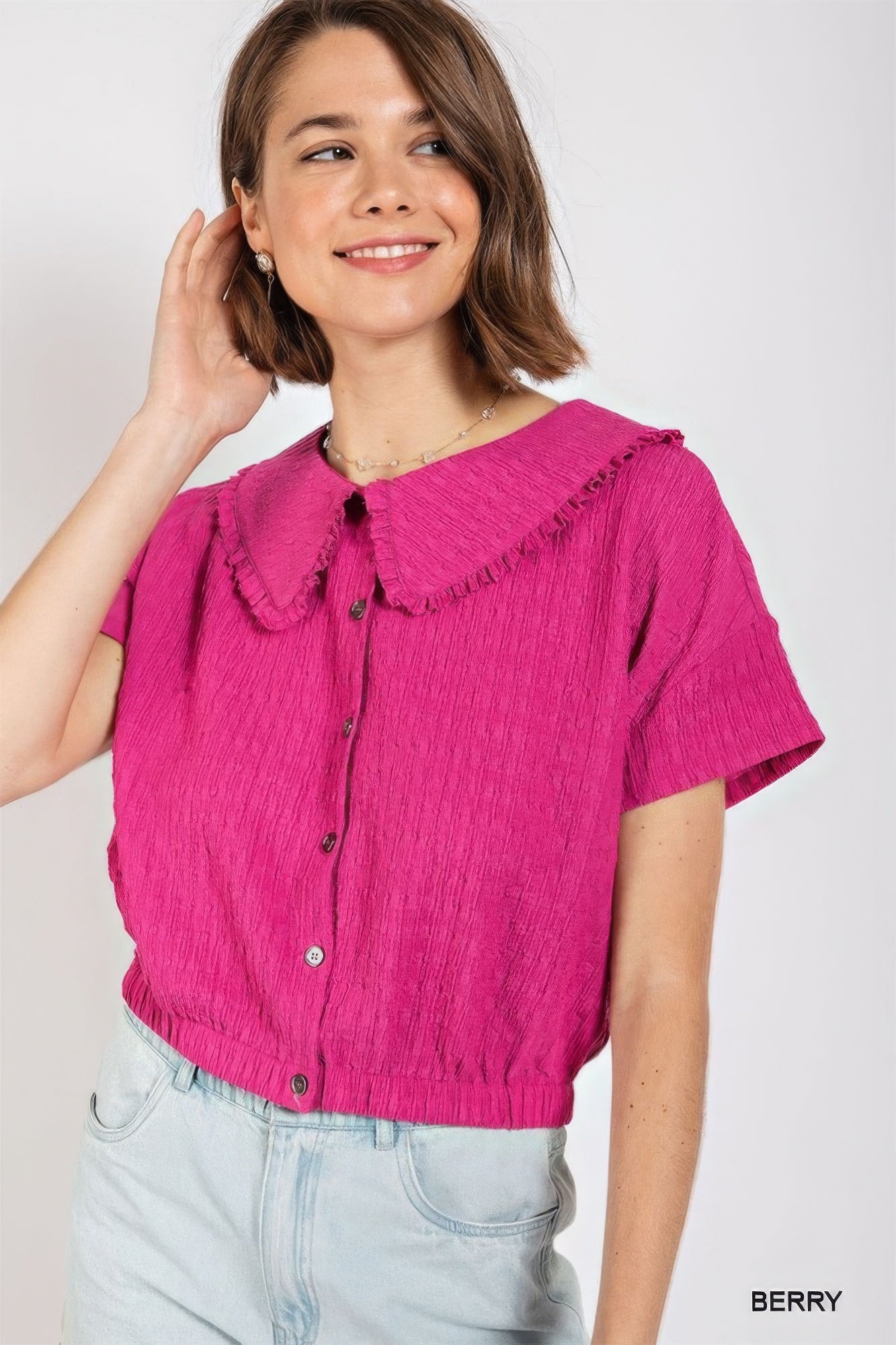 Peter pan collar textured knit button down top